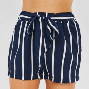 blue striped shorts with belt